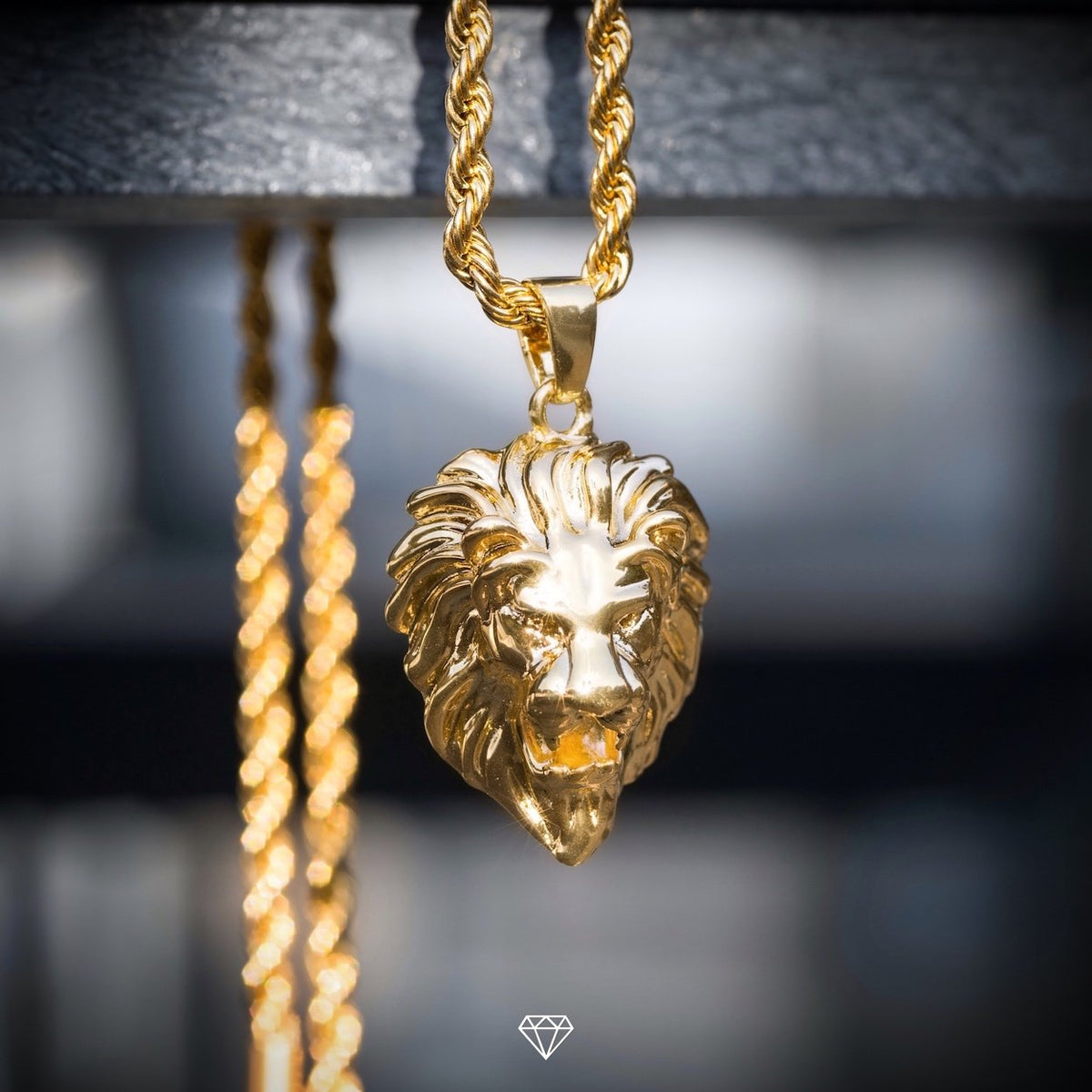 LION PENDANT IN YELLOW GOLD